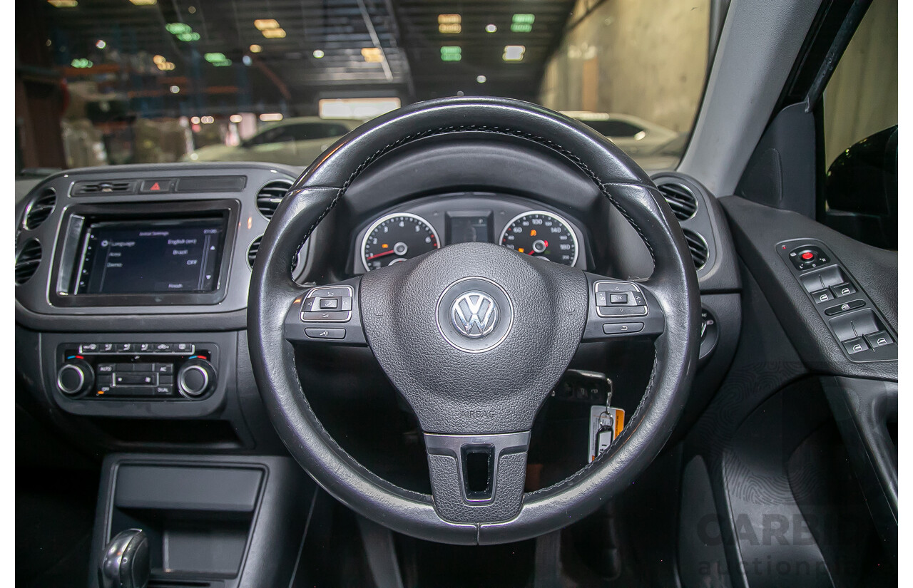 3/2012 Volkswagen Tiguan 132 TSI Pacific (AWD) 5NC MY12 4d Wagon Black Turbo 2.0L