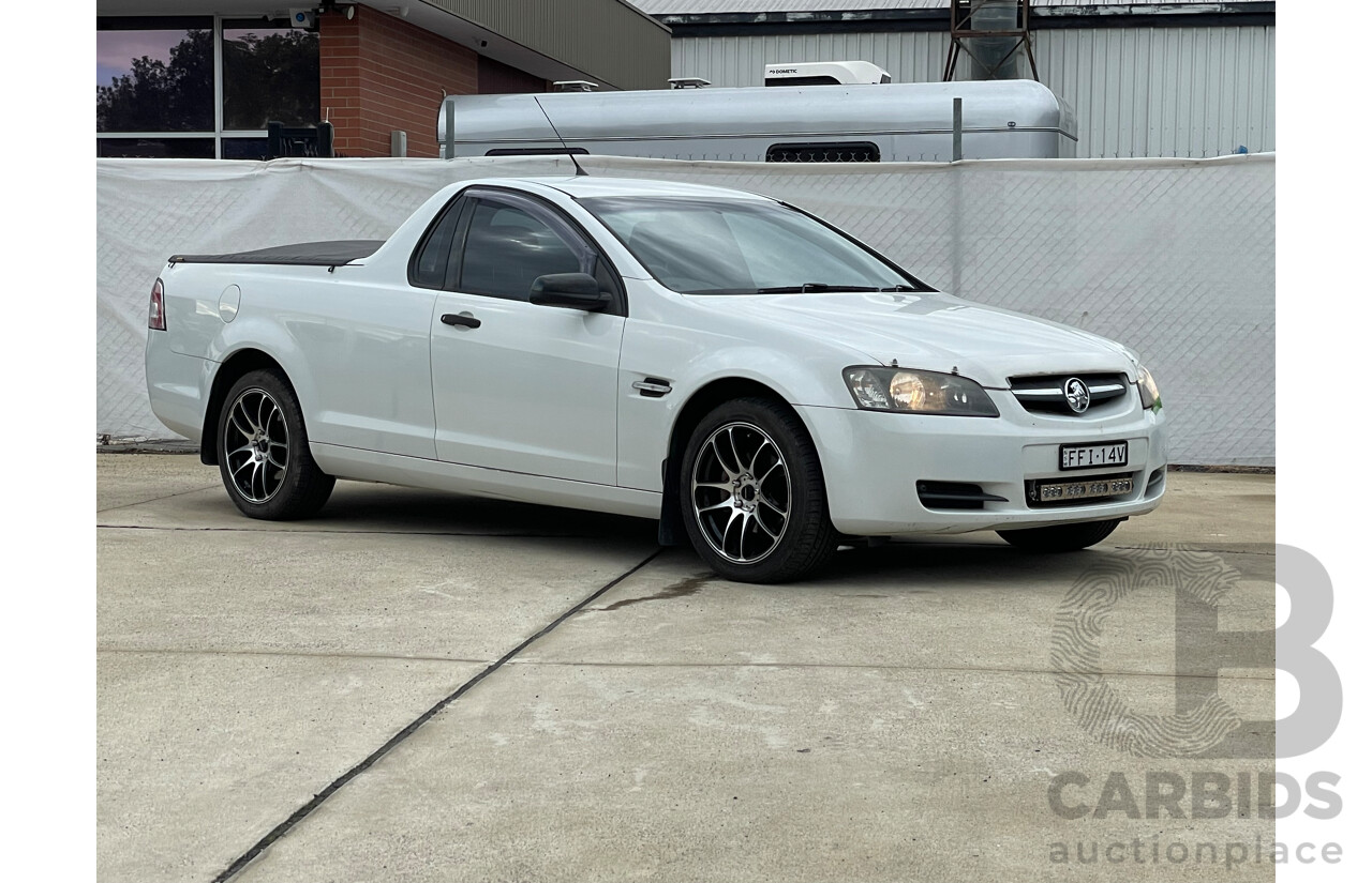 01/10 Holden Commodore OMEGA RWD VE MY10 Utility White 3.6L