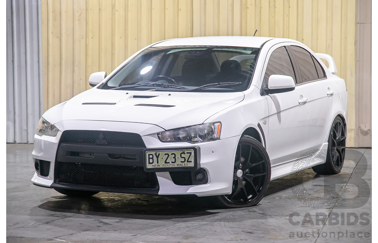 8/2010 Mitsubishi Lancer Ralliart (AWD) CJ MY10 4d Sedan White Turbo 2.0L