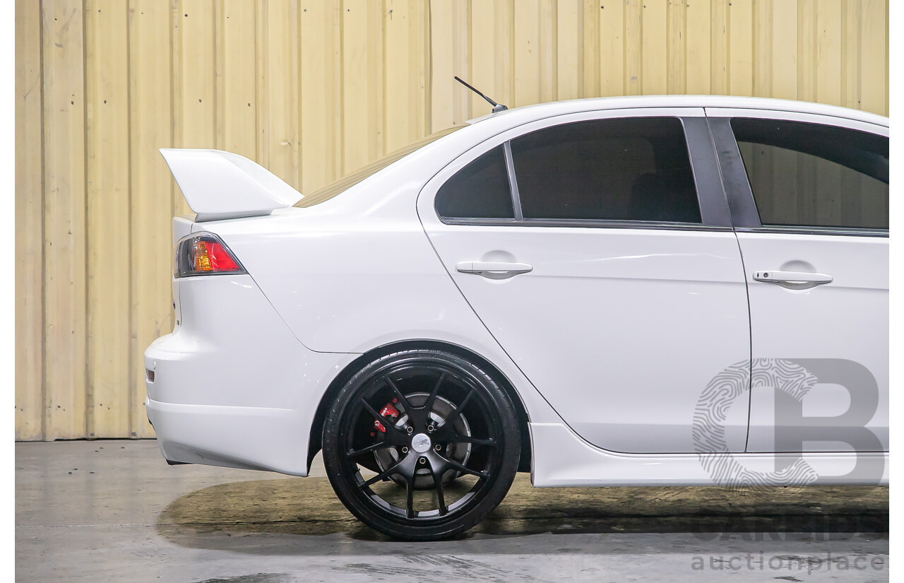 8/2010 Mitsubishi Lancer Ralliart (AWD) CJ MY10 4d Sedan White Turbo 2.0L
