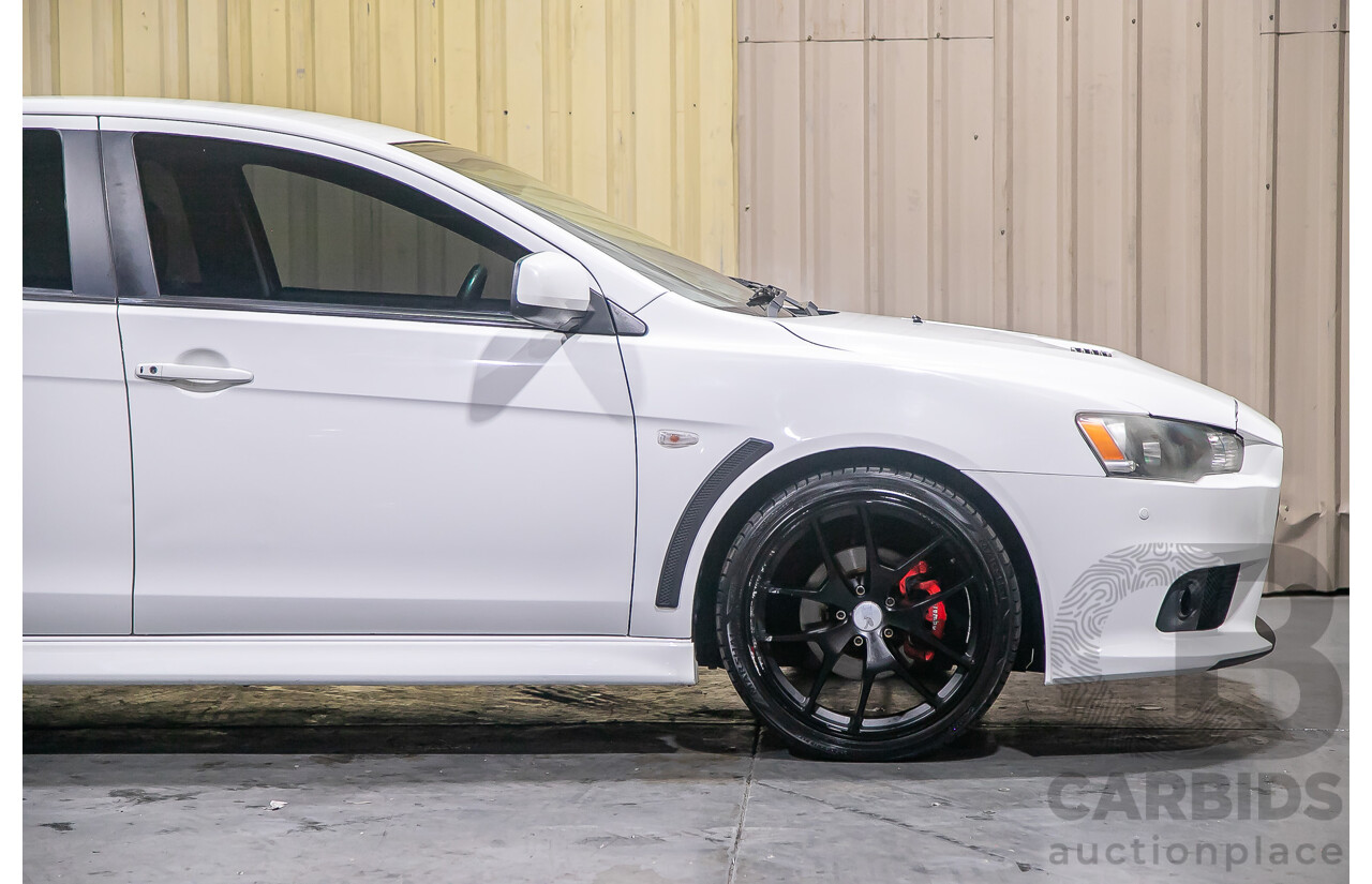8/2010 Mitsubishi Lancer Ralliart (AWD) CJ MY10 4d Sedan White Turbo 2.0L