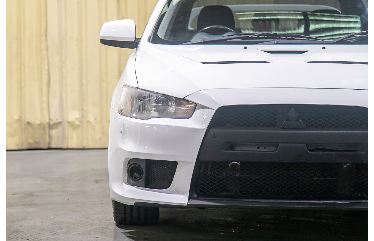 8/2010 Mitsubishi Lancer Ralliart (AWD) CJ MY10 4d Sedan White Turbo 2.0L