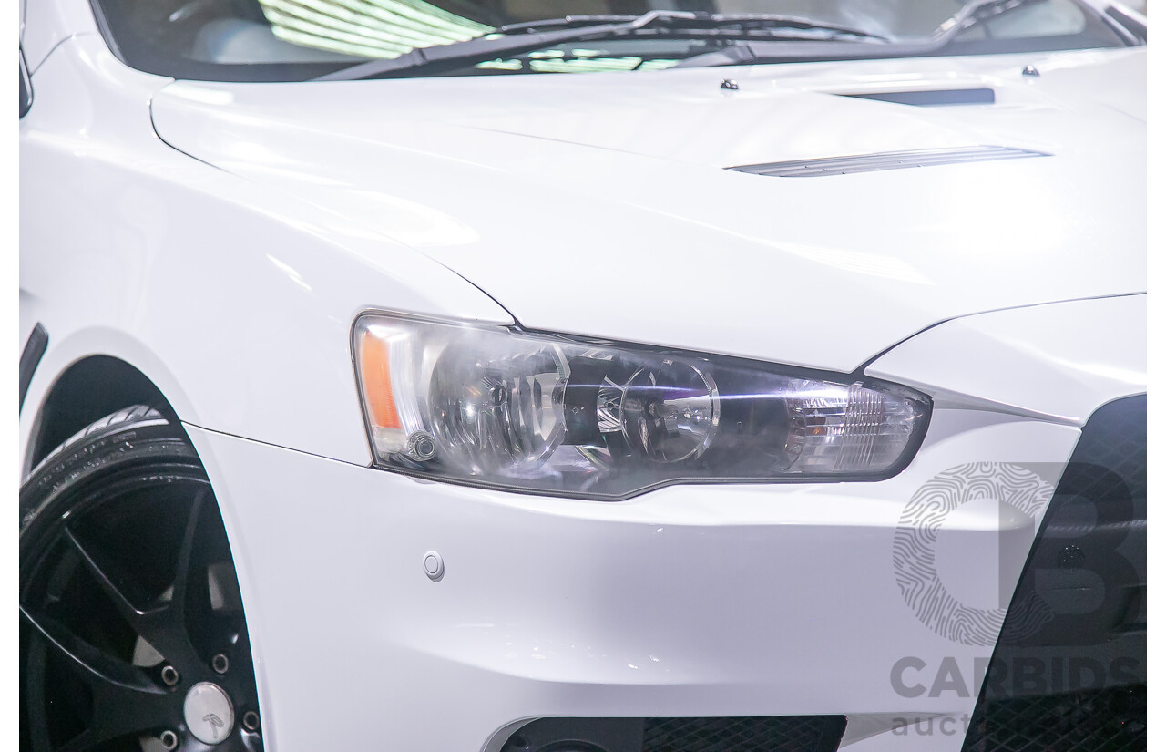 8/2010 Mitsubishi Lancer Ralliart (AWD) CJ MY10 4d Sedan White Turbo 2.0L