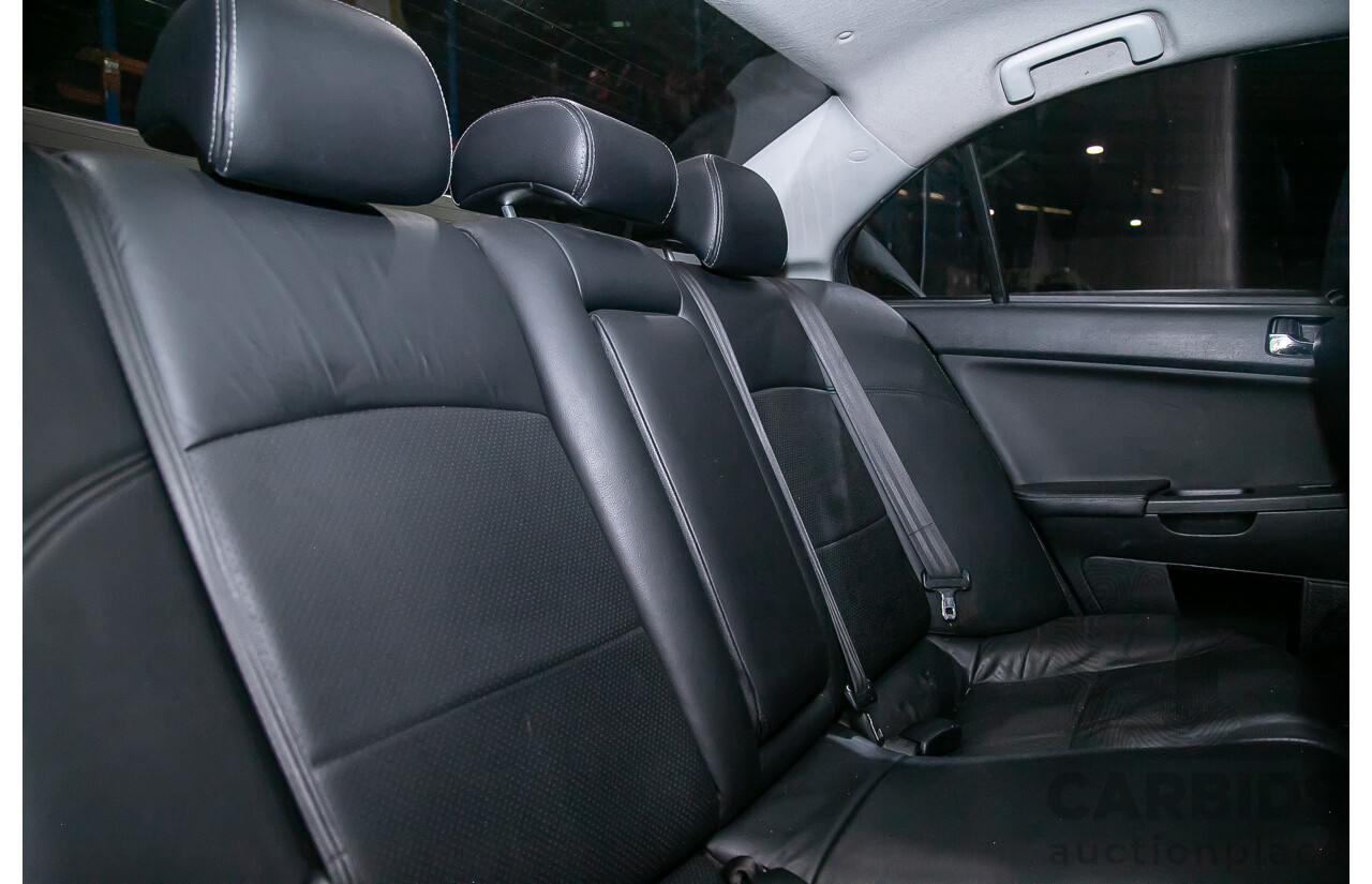 8/2010 Mitsubishi Lancer Ralliart (AWD) CJ MY10 4d Sedan White Turbo 2.0L