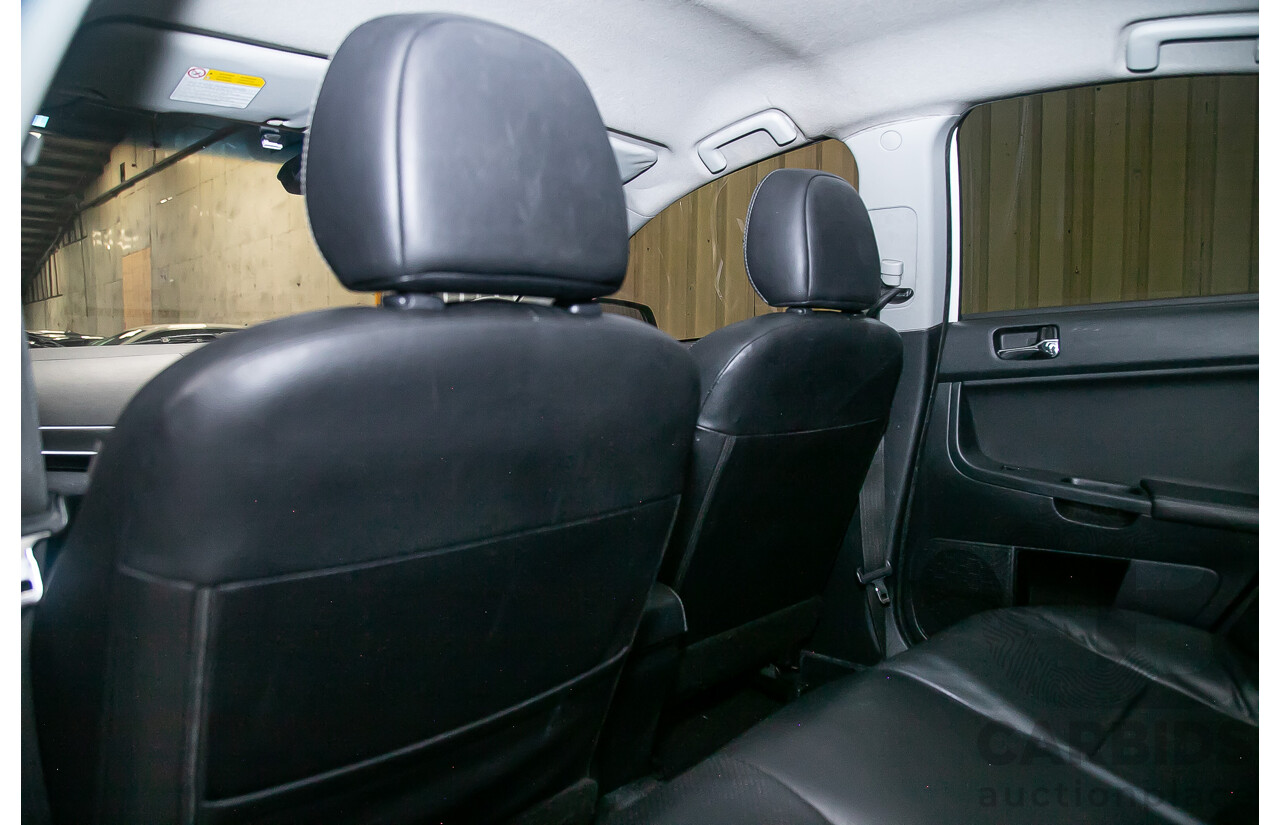 8/2010 Mitsubishi Lancer Ralliart (AWD) CJ MY10 4d Sedan White Turbo 2.0L