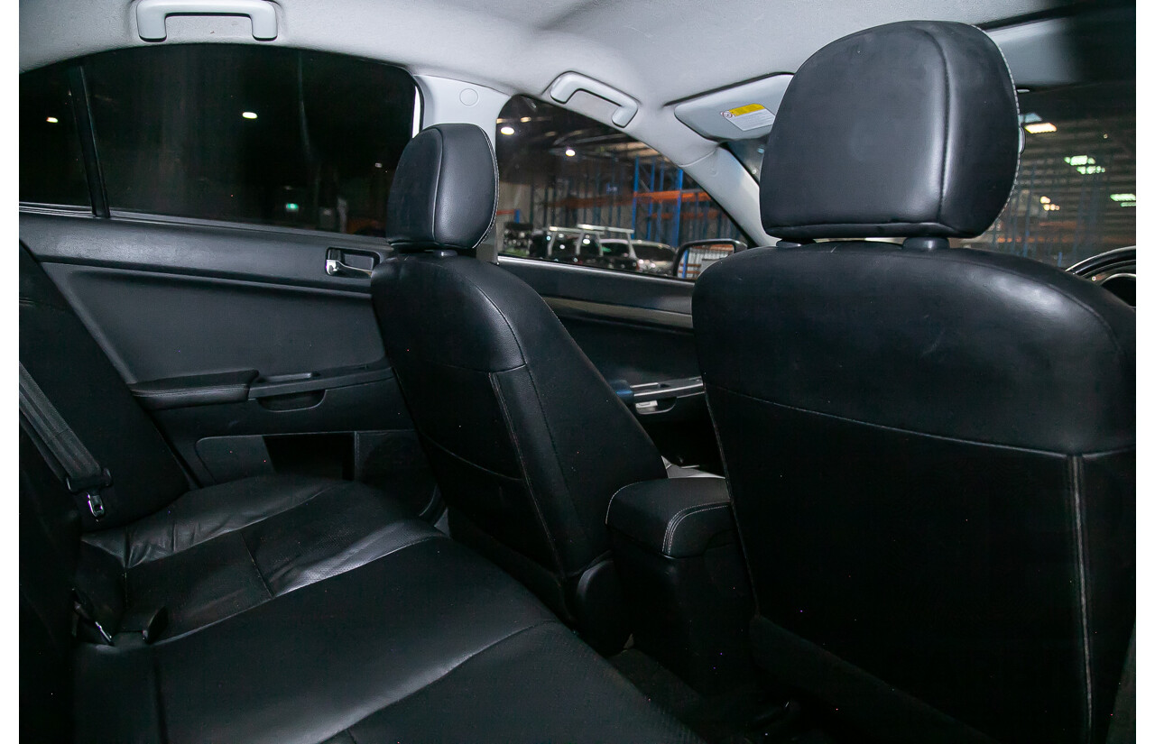 8/2010 Mitsubishi Lancer Ralliart (AWD) CJ MY10 4d Sedan White Turbo 2.0L