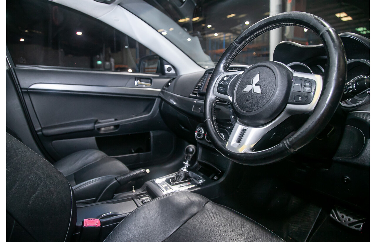 8/2010 Mitsubishi Lancer Ralliart (AWD) CJ MY10 4d Sedan White Turbo 2.0L