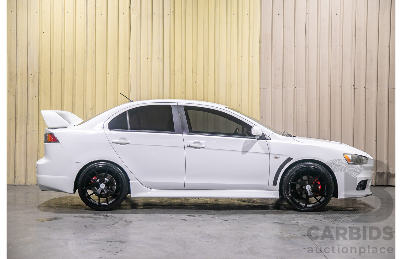 8/2010 Mitsubishi Lancer Ralliart (AWD) CJ MY10 4d Sedan White Turbo 2.0L