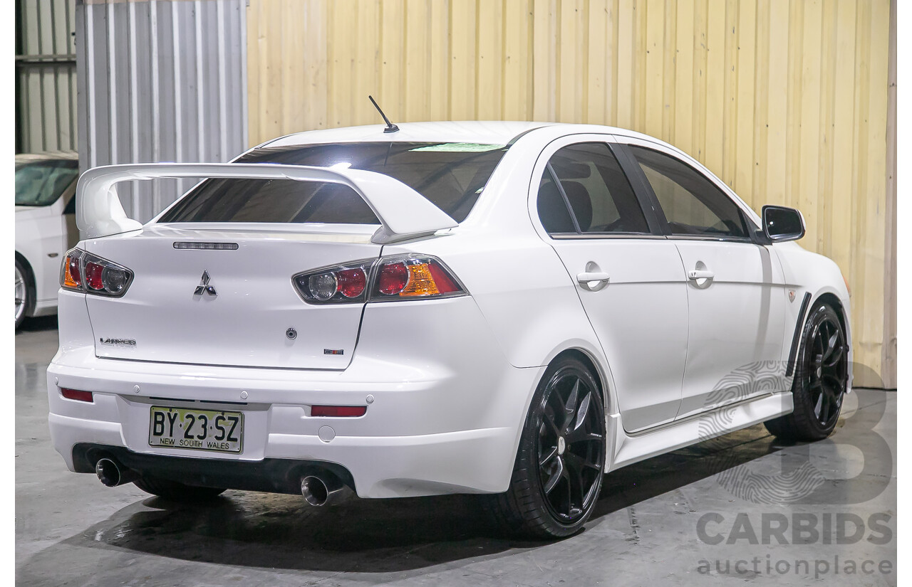 8/2010 Mitsubishi Lancer Ralliart (AWD) CJ MY10 4d Sedan White Turbo 2.0L