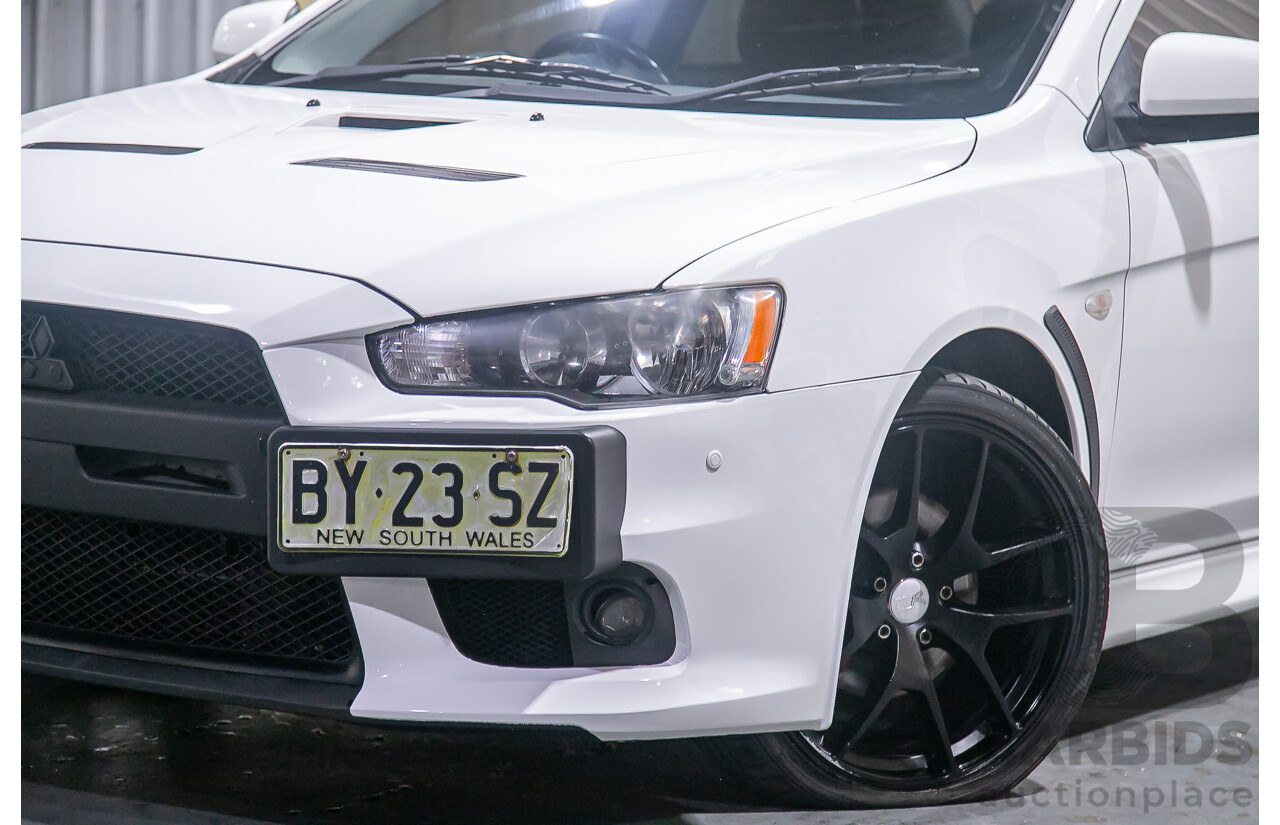 8/2010 Mitsubishi Lancer Ralliart (AWD) CJ MY10 4d Sedan White Turbo 2.0L
