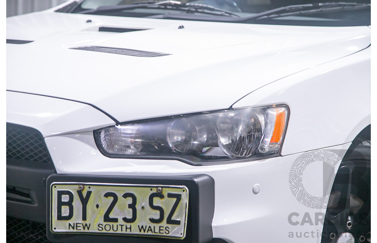 8/2010 Mitsubishi Lancer Ralliart (AWD) CJ MY10 4d Sedan White Turbo 2.0L