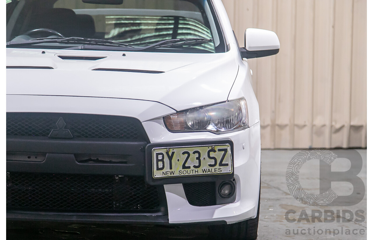 8/2010 Mitsubishi Lancer Ralliart (AWD) CJ MY10 4d Sedan White Turbo 2.0L