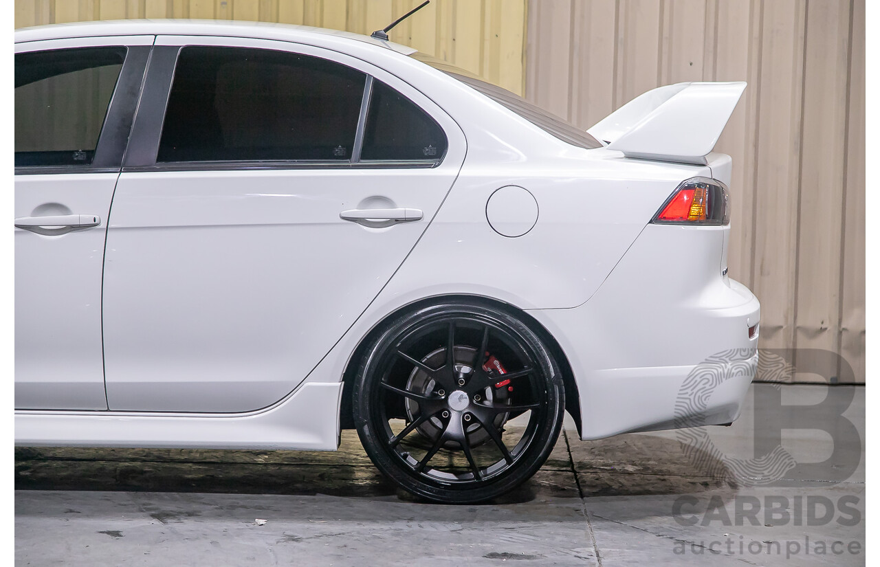 8/2010 Mitsubishi Lancer Ralliart (AWD) CJ MY10 4d Sedan White Turbo 2.0L