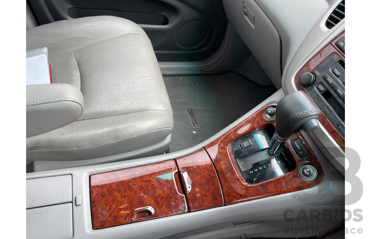 4/2004 Toyota Kluger Grande (4x4) MCU28R 4d Wagon Blue 3.3L