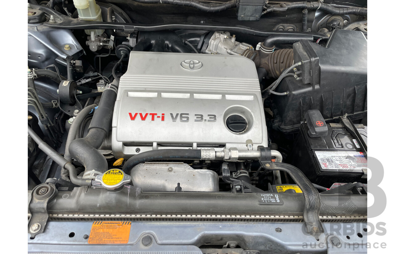 4/2004 Toyota Kluger Grande (4x4) MCU28R 4d Wagon Blue 3.3L