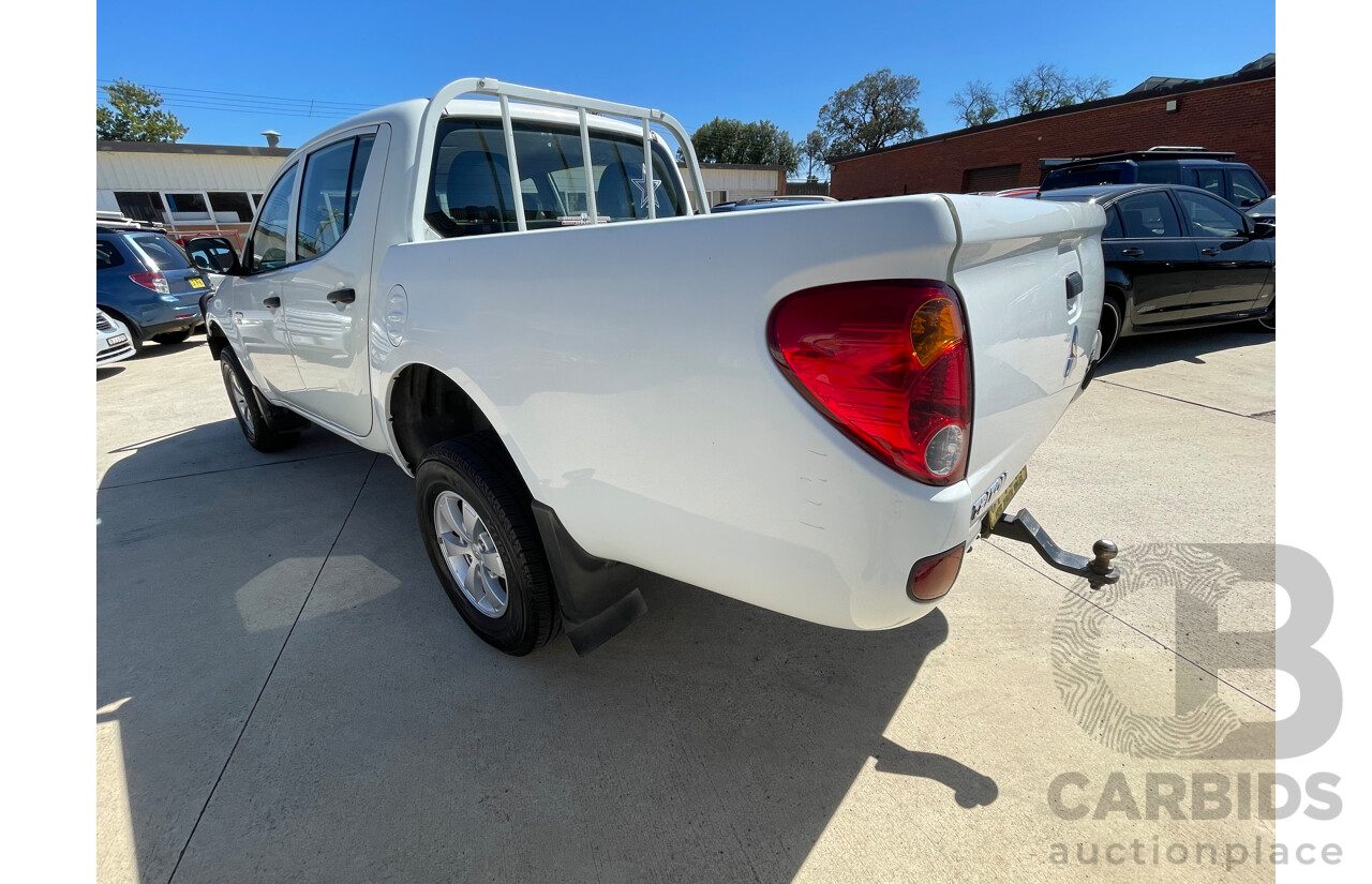9/2009 Mitsubishi Triton GLX MN MY10 Double Cab Utility White 2.5L