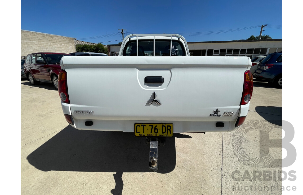9/2009 Mitsubishi Triton GLX MN MY10 Double Cab Utility White 2.5L