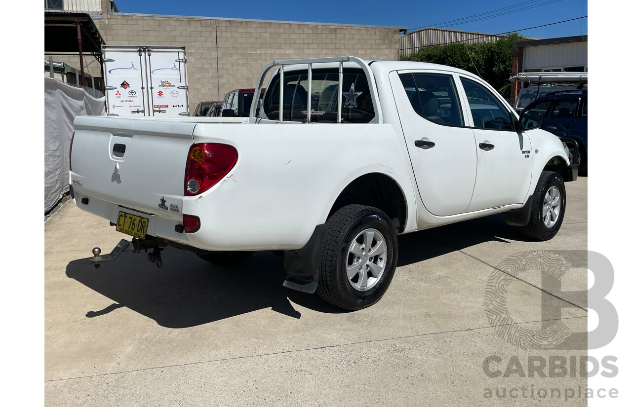 9/2009 Mitsubishi Triton GLX MN MY10 Double Cab Utility White 2.5L