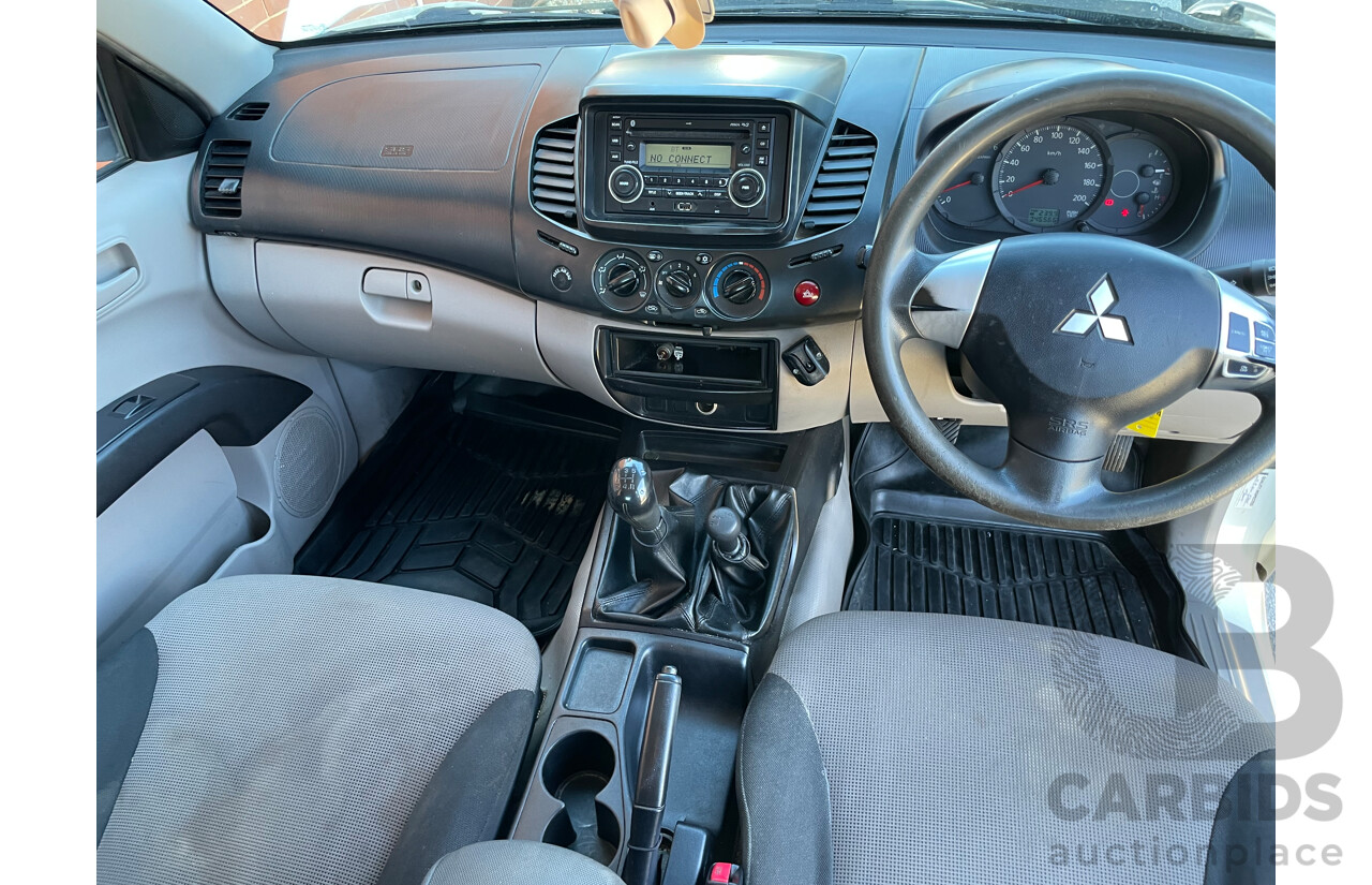 9/2009 Mitsubishi Triton GLX MN MY10 Double Cab Utility White 2.5L