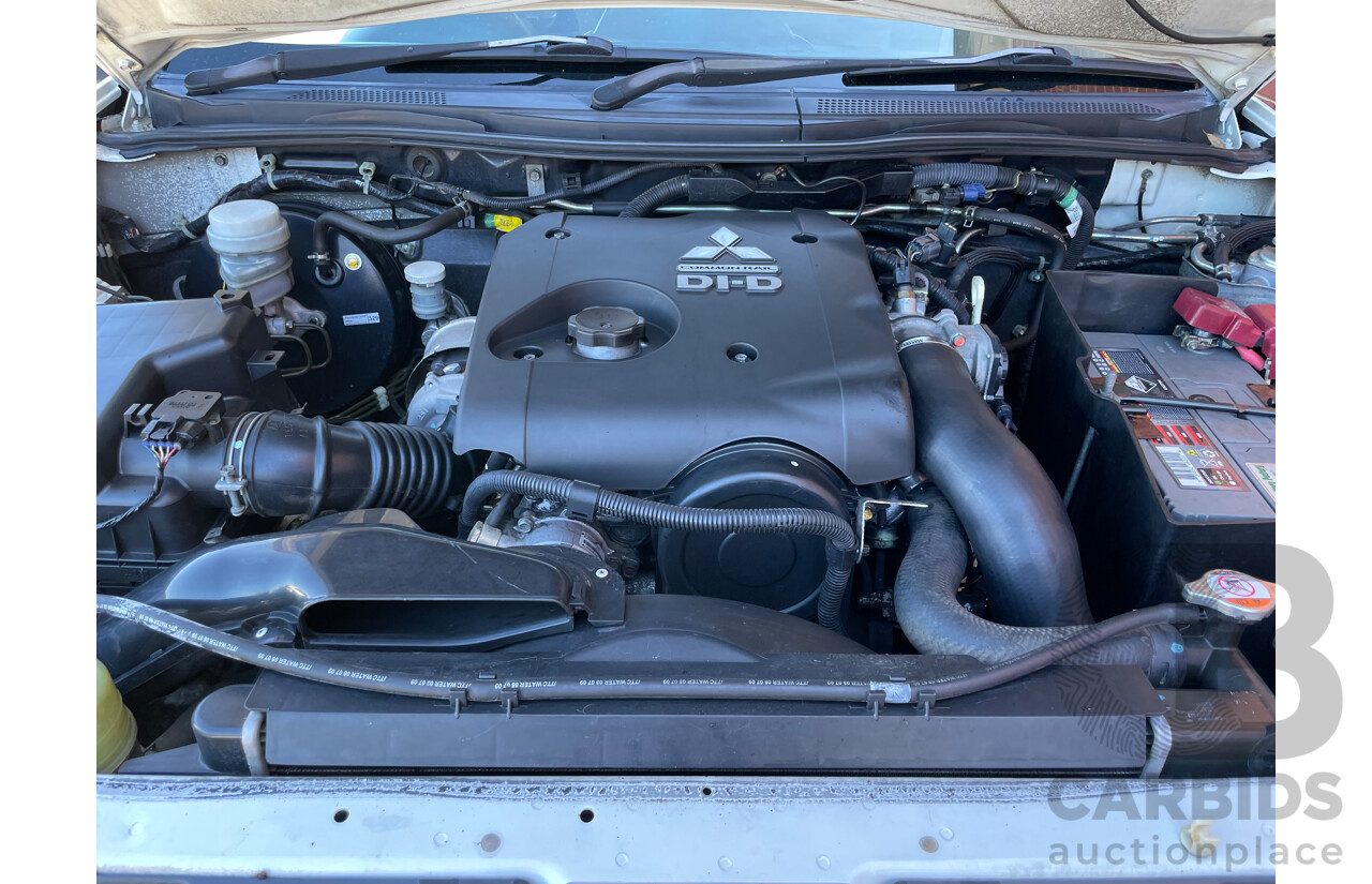 9/2009 Mitsubishi Triton GLX MN MY10 Double Cab Utility White 2.5L