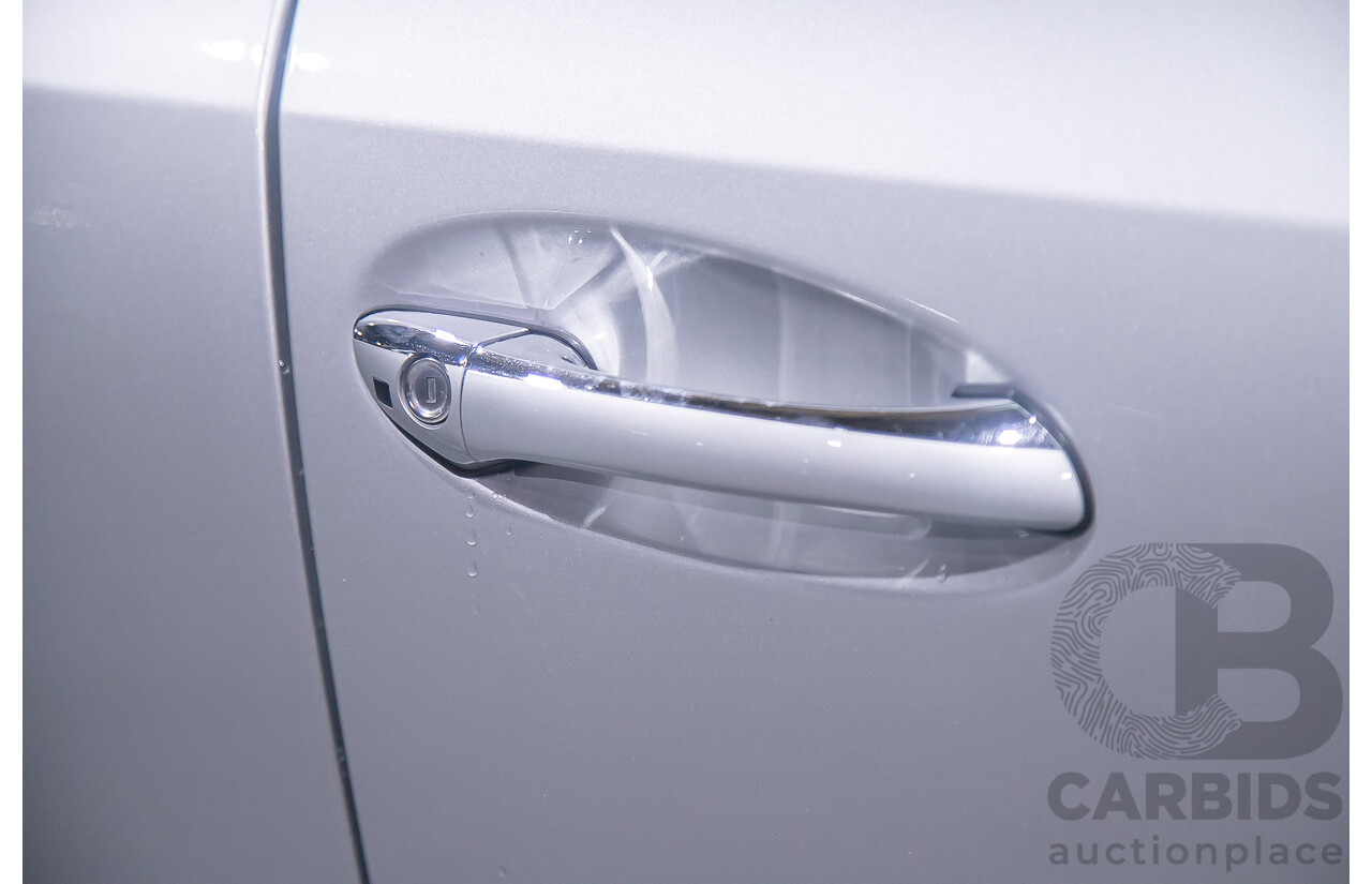 10/2004 Mercedes Benz E55 AMG W211 4d Sedan Brilliant Silver Metallic Supercharged V8 5.4L