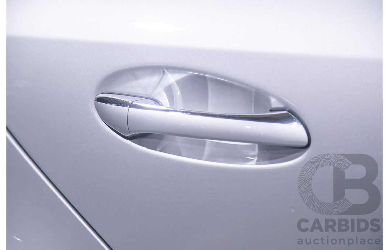 10/2004 Mercedes Benz E55 AMG W211 4d Sedan Brilliant Silver Metallic Supercharged V8 5.4L