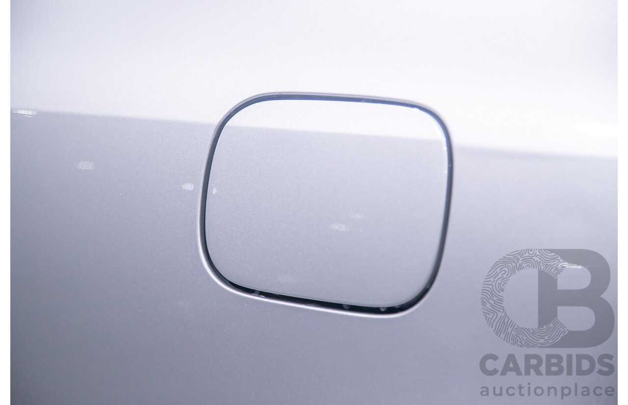 10/2004 Mercedes Benz E55 AMG W211 4d Sedan Brilliant Silver Metallic Supercharged V8 5.4L