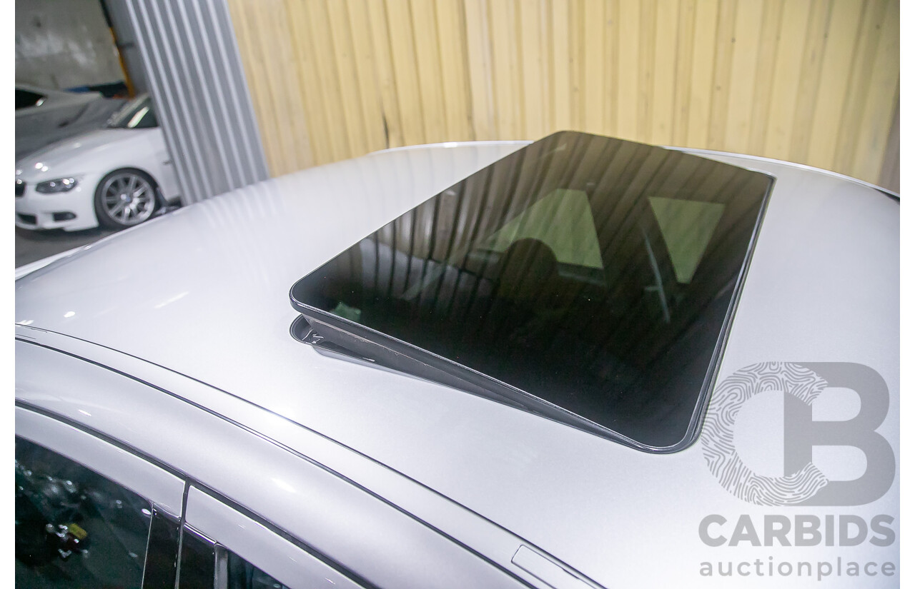 10/2004 Mercedes Benz E55 AMG W211 4d Sedan Brilliant Silver Metallic Supercharged V8 5.4L