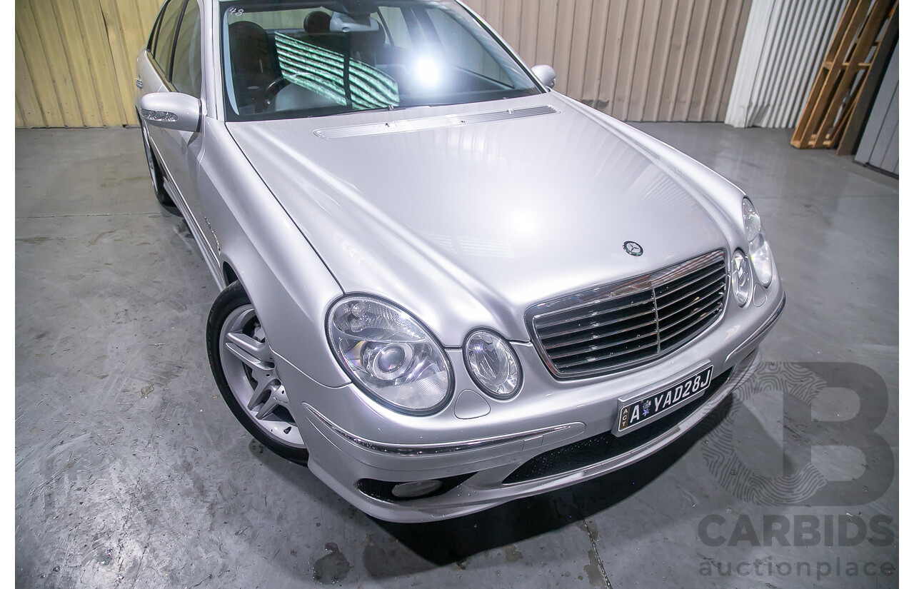 10/2004 Mercedes Benz E55 AMG W211 4d Sedan Brilliant Silver Metallic Supercharged V8 5.4L