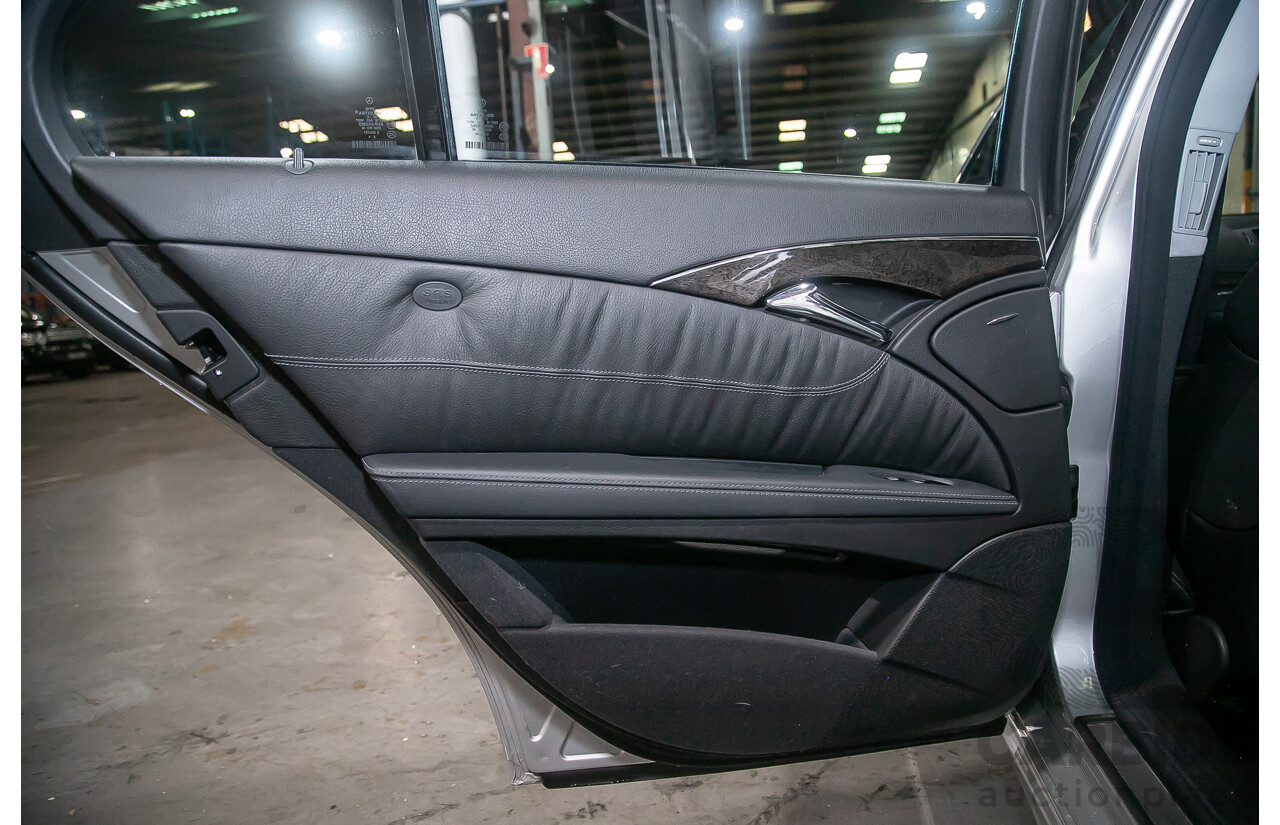 10/2004 Mercedes Benz E55 AMG W211 4d Sedan Brilliant Silver Metallic Supercharged V8 5.4L