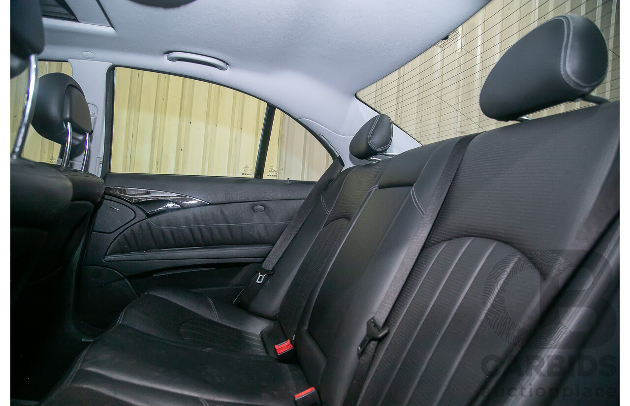 10/2004 Mercedes Benz E55 AMG W211 4d Sedan Brilliant Silver Metallic Supercharged V8 5.4L