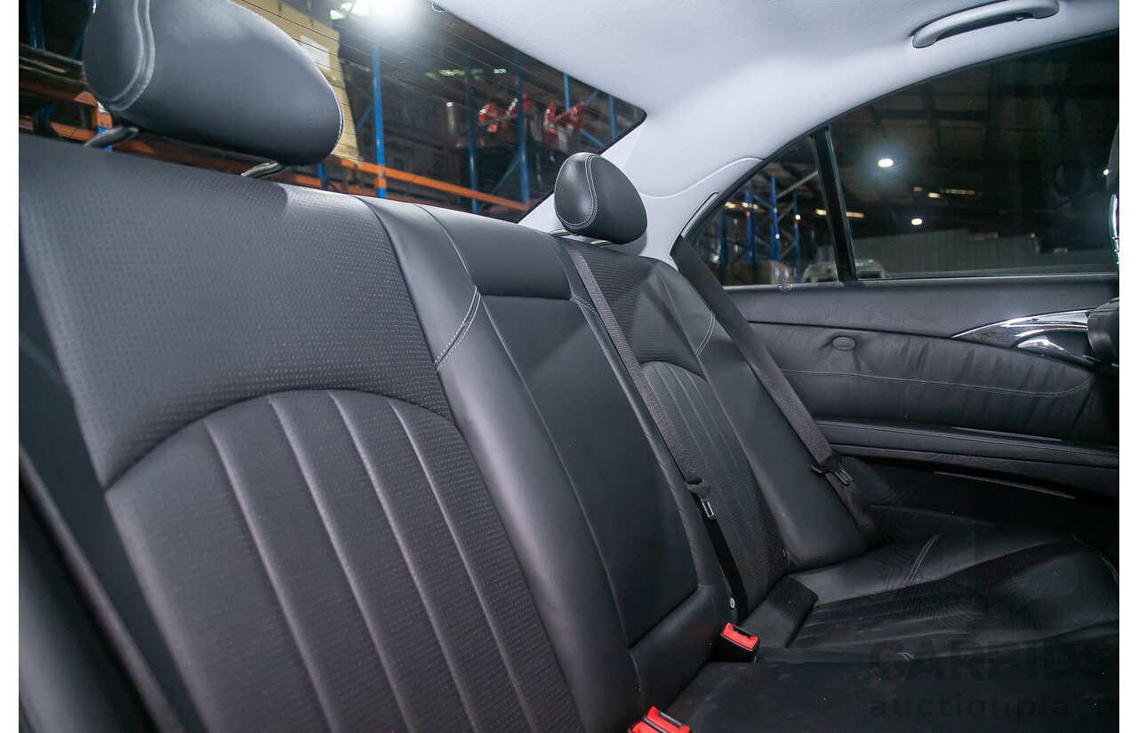 10/2004 Mercedes Benz E55 AMG W211 4d Sedan Brilliant Silver Metallic Supercharged V8 5.4L