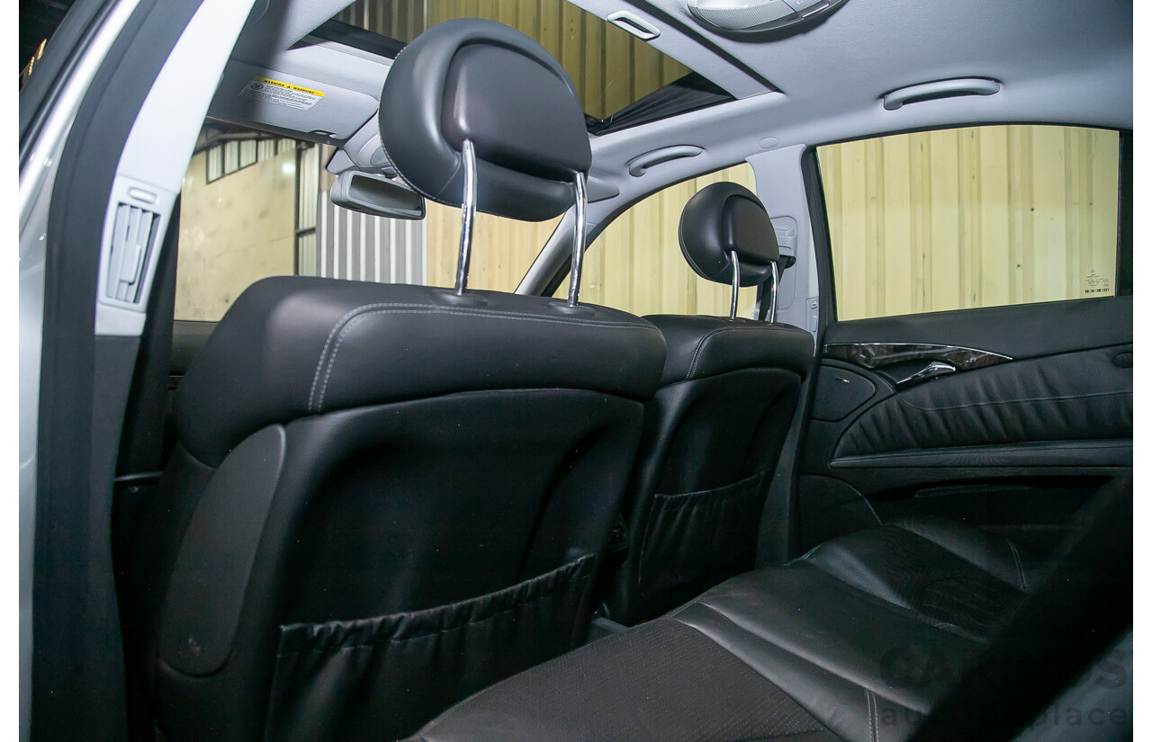 10/2004 Mercedes Benz E55 AMG W211 4d Sedan Brilliant Silver Metallic Supercharged V8 5.4L