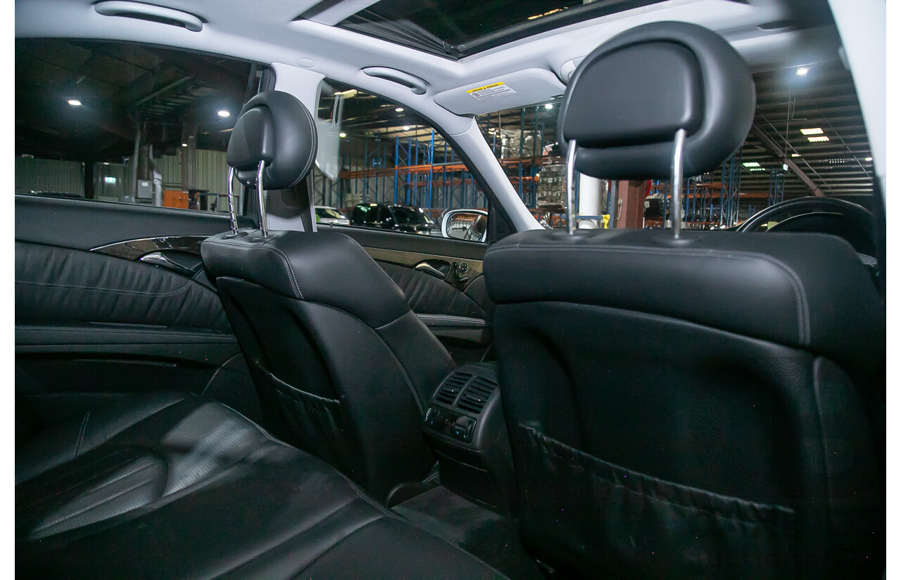 10/2004 Mercedes Benz E55 AMG W211 4d Sedan Brilliant Silver Metallic Supercharged V8 5.4L