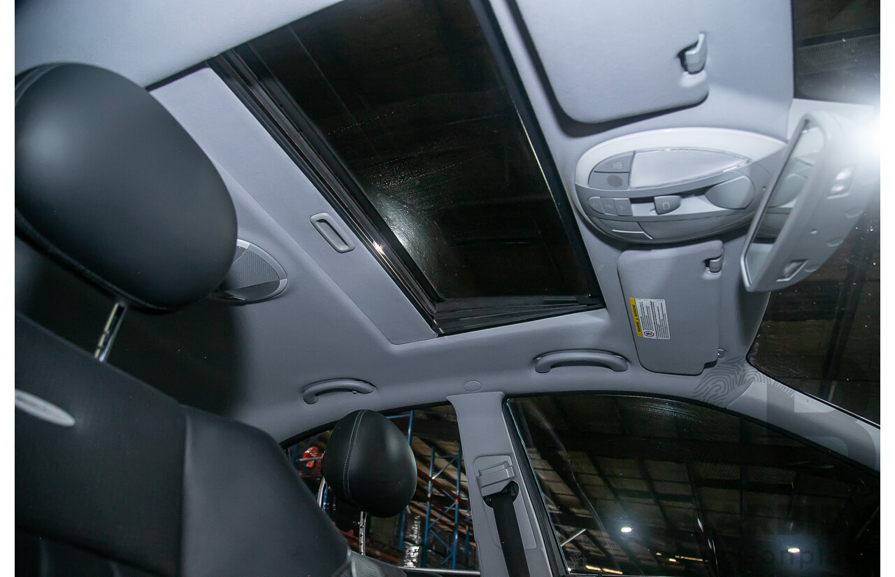 10/2004 Mercedes Benz E55 AMG W211 4d Sedan Brilliant Silver Metallic Supercharged V8 5.4L