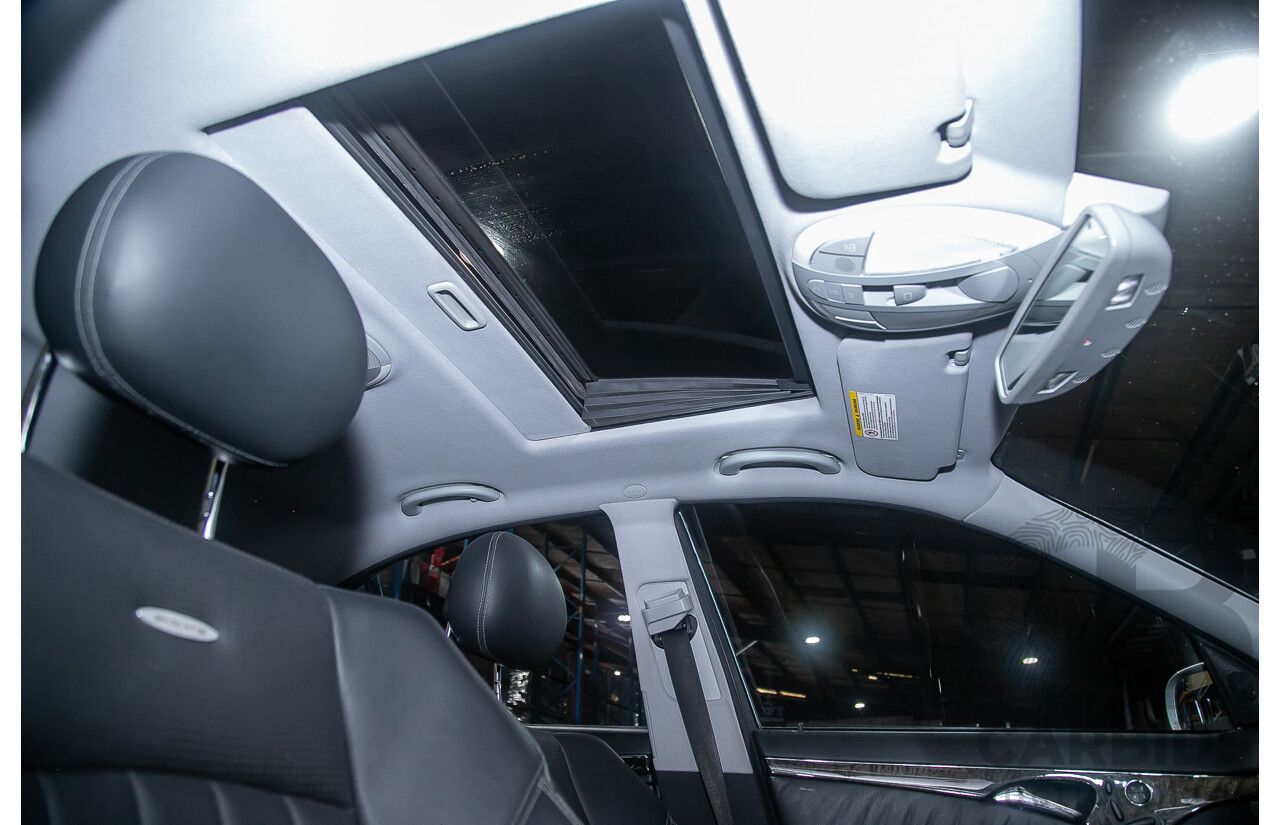 10/2004 Mercedes Benz E55 AMG W211 4d Sedan Brilliant Silver Metallic Supercharged V8 5.4L