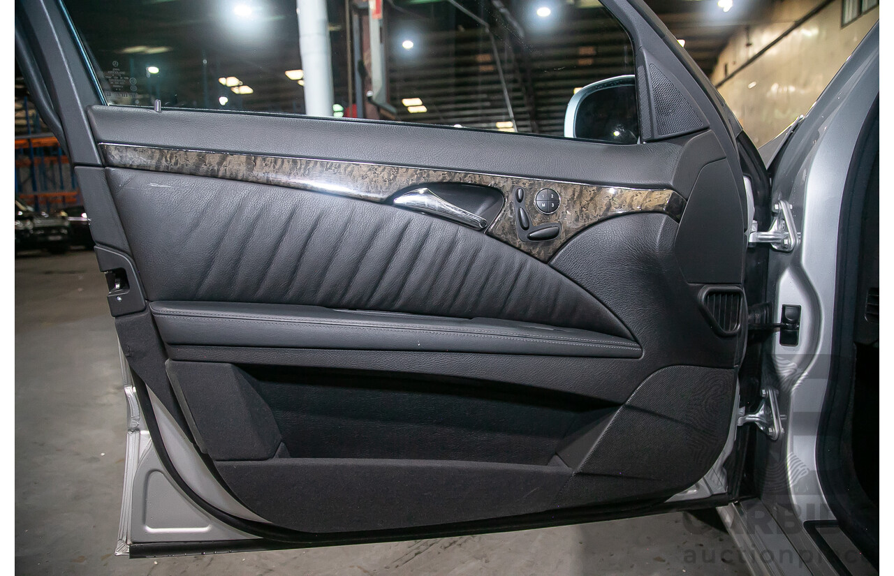 10/2004 Mercedes Benz E55 AMG W211 4d Sedan Brilliant Silver Metallic Supercharged V8 5.4L