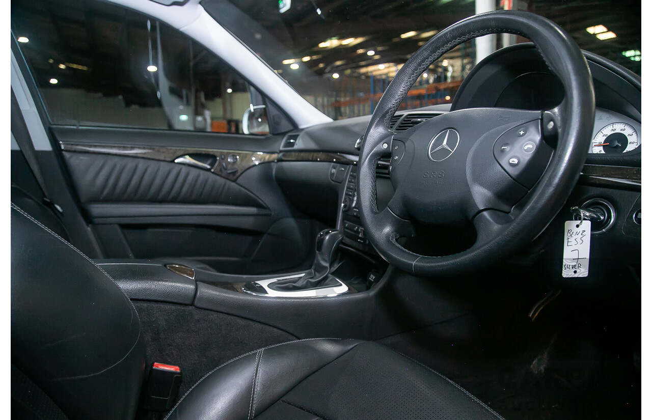 10/2004 Mercedes Benz E55 AMG W211 4d Sedan Brilliant Silver Metallic Supercharged V8 5.4L