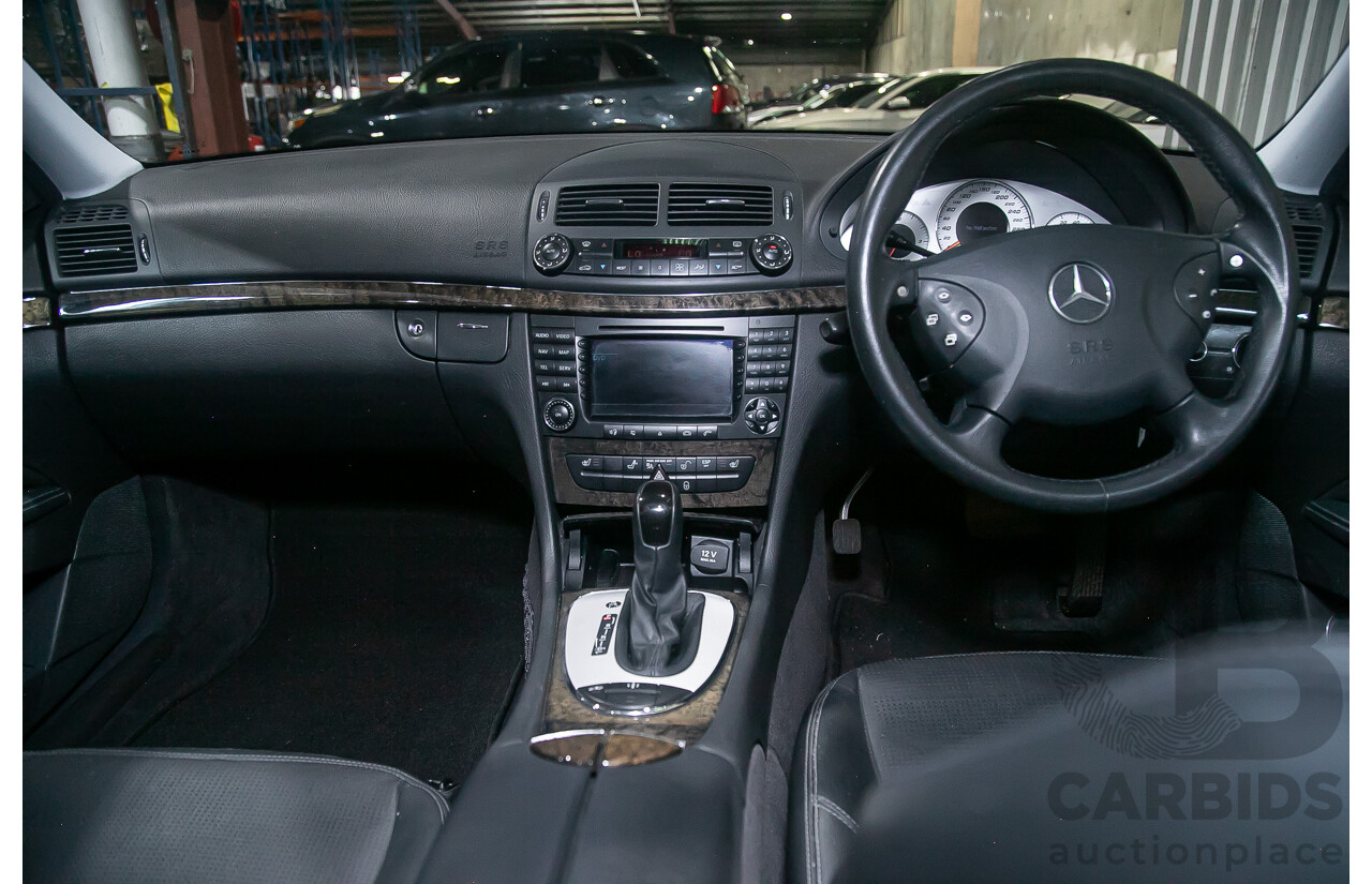 10/2004 Mercedes Benz E55 AMG W211 4d Sedan Brilliant Silver Metallic Supercharged V8 5.4L