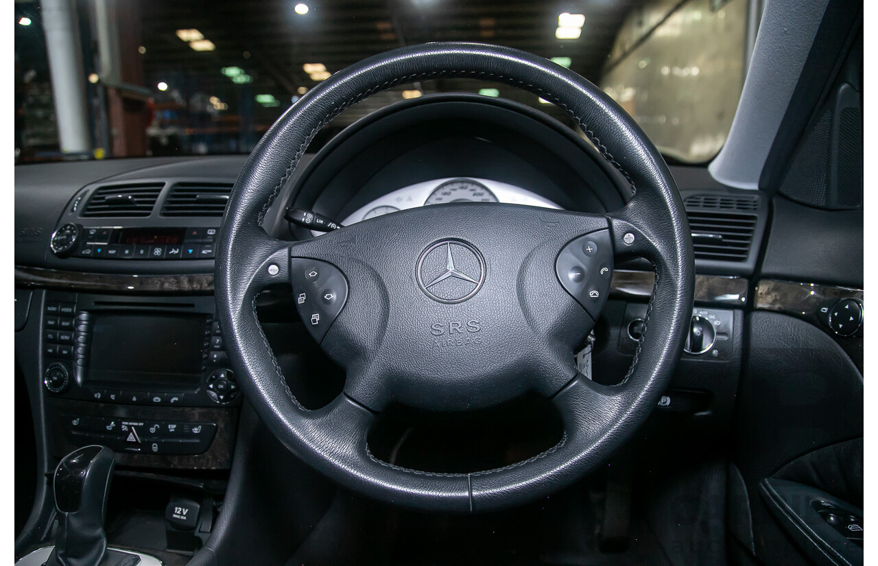 10/2004 Mercedes Benz E55 AMG W211 4d Sedan Brilliant Silver Metallic Supercharged V8 5.4L