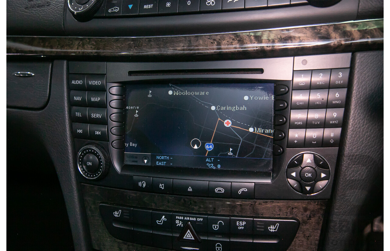 10/2004 Mercedes Benz E55 AMG W211 4d Sedan Brilliant Silver Metallic Supercharged V8 5.4L