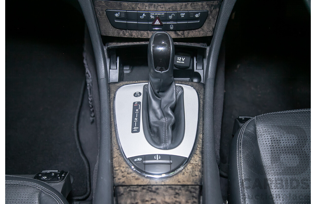 10/2004 Mercedes Benz E55 AMG W211 4d Sedan Brilliant Silver Metallic Supercharged V8 5.4L