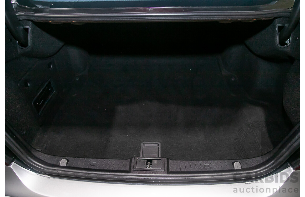 10/2004 Mercedes Benz E55 AMG W211 4d Sedan Brilliant Silver Metallic Supercharged V8 5.4L