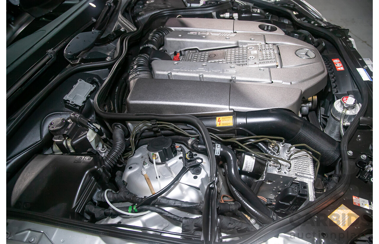 10/2004 Mercedes Benz E55 AMG W211 4d Sedan Brilliant Silver Metallic Supercharged V8 5.4L