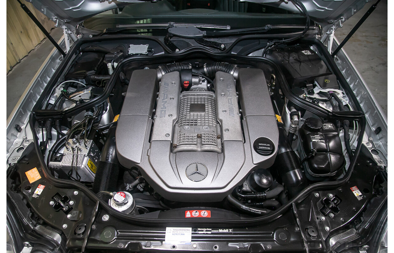 10/2004 Mercedes Benz E55 AMG W211 4d Sedan Brilliant Silver Metallic Supercharged V8 5.4L