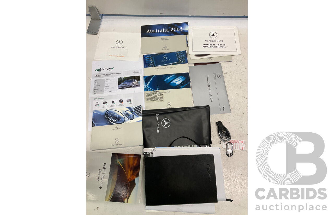 10/2004 Mercedes Benz E55 AMG W211 4d Sedan Brilliant Silver Metallic Supercharged V8 5.4L