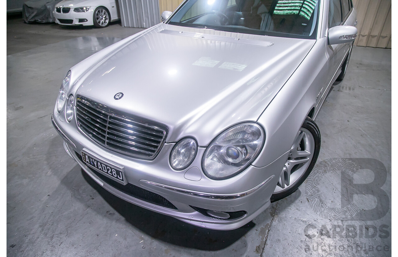 10/2004 Mercedes Benz E55 AMG W211 4d Sedan Brilliant Silver Metallic Supercharged V8 5.4L