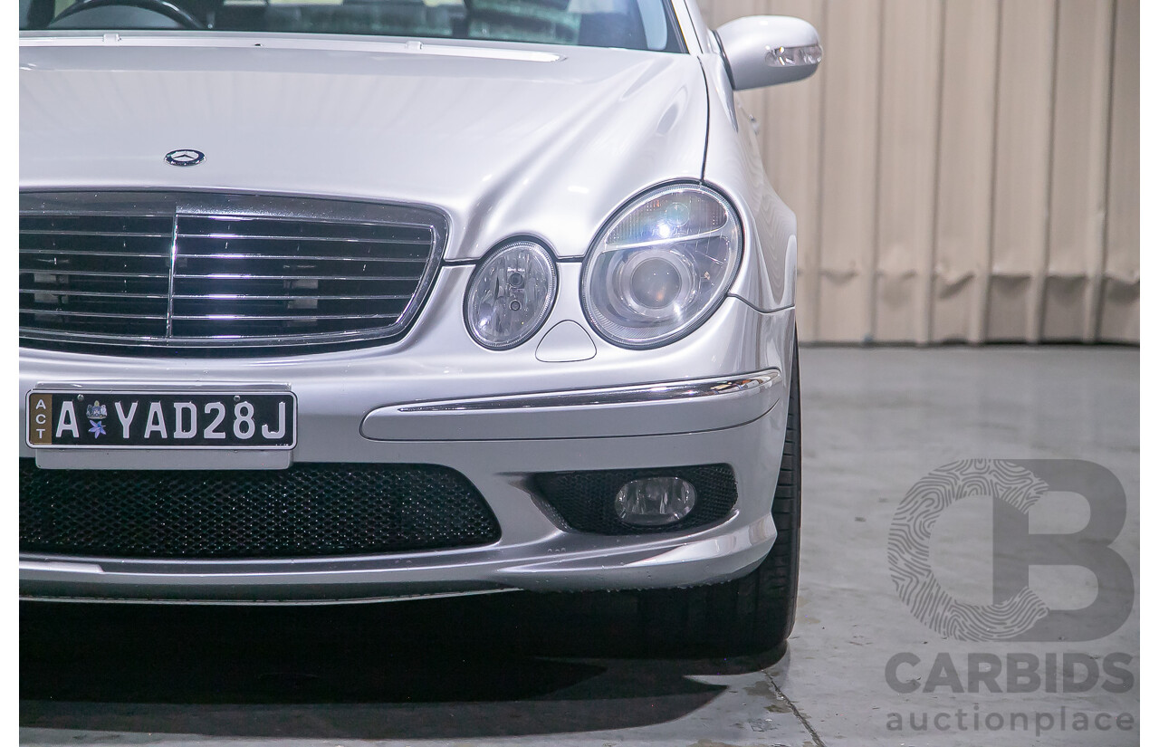 10/2004 Mercedes Benz E55 AMG W211 4d Sedan Brilliant Silver Metallic Supercharged V8 5.4L