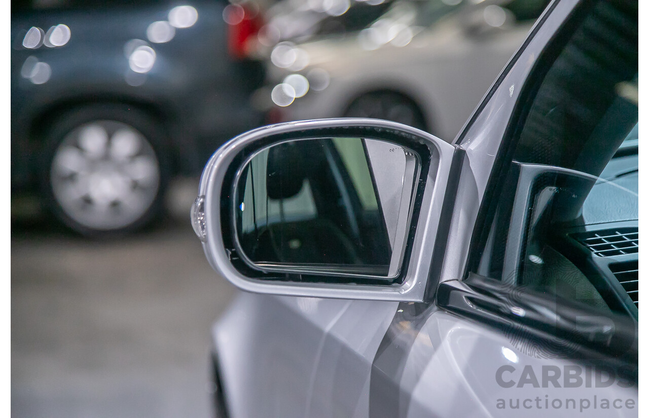 10/2004 Mercedes Benz E55 AMG W211 4d Sedan Brilliant Silver Metallic Supercharged V8 5.4L