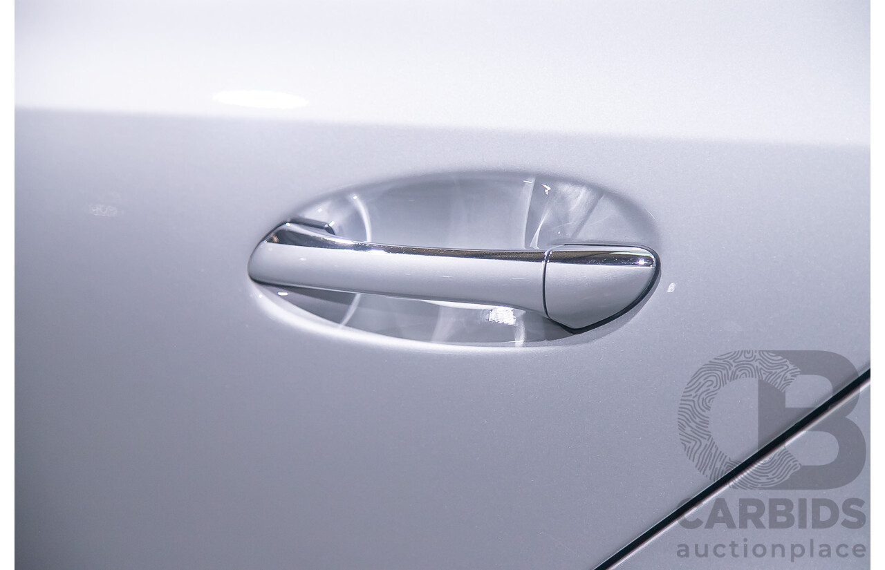 10/2004 Mercedes Benz E55 AMG W211 4d Sedan Brilliant Silver Metallic Supercharged V8 5.4L